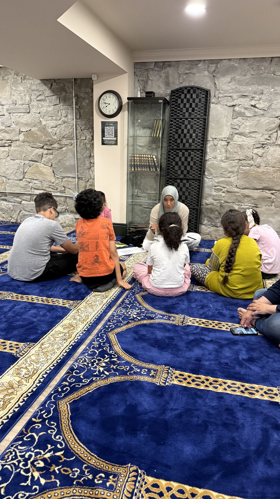 Young students attending a Qur’an class at the Cochrane musallah