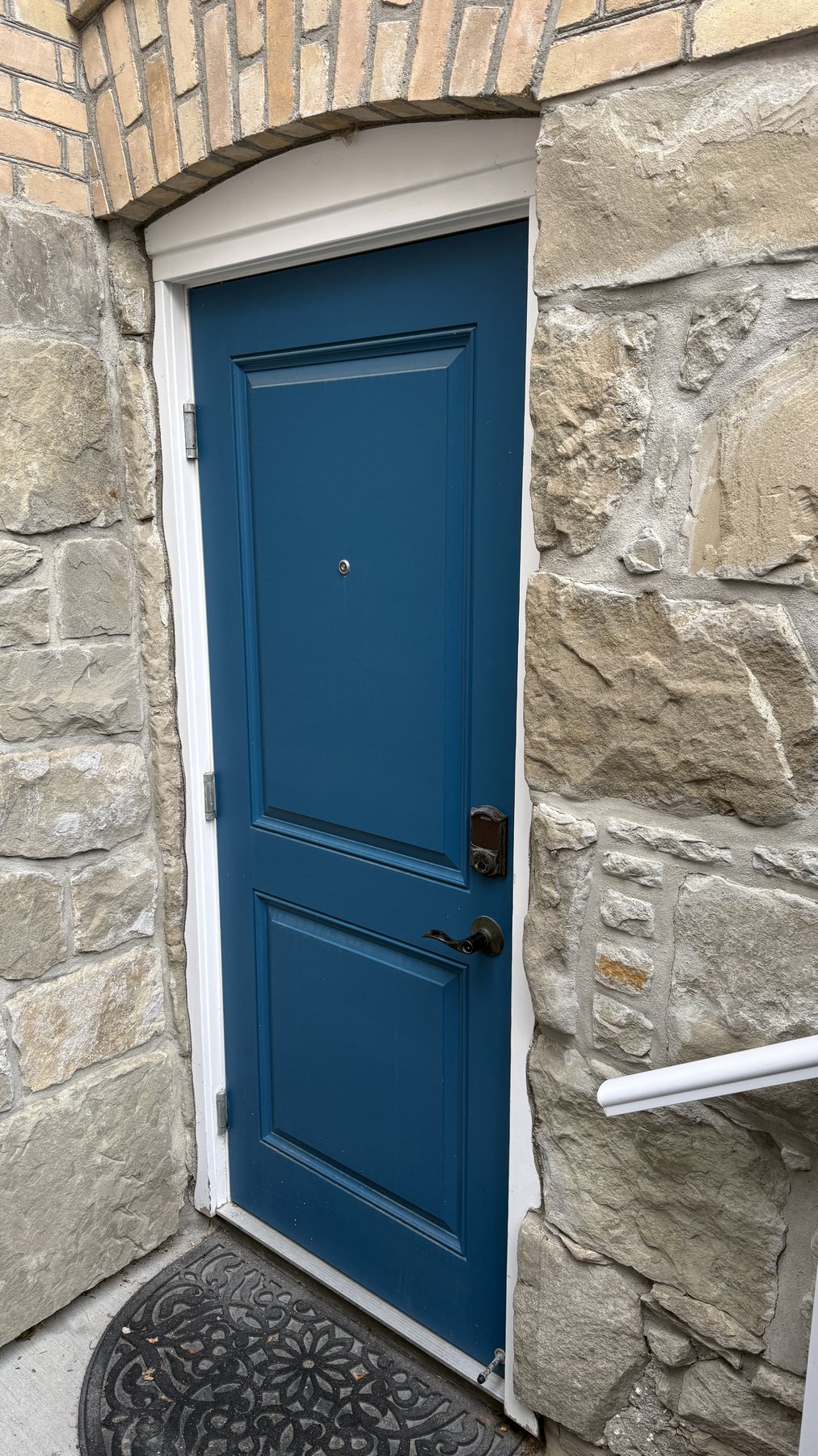 Blue entrance door to the community musallah